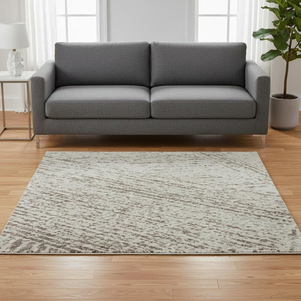 HomeRoots 5' X 8' Beige and Brown Abstract Area Rug – Washable, UV-Protected, Durable for High-Traffic Homes 678121
