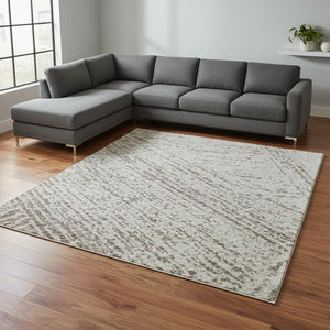 HomeRoots 8' X 10' Beige and Brown Abstract Area Rug - Washable, UV-Protected, Stain-Resistant, Durable Design 678123