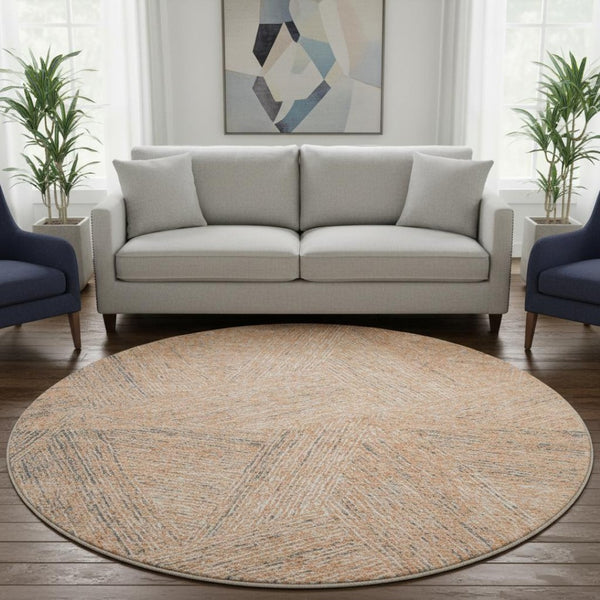 HomeRoots 8' Contemporary Peach Ivory Gray Abstract Washable Round Rug with UV Protection for High-Traffic Areas 678170