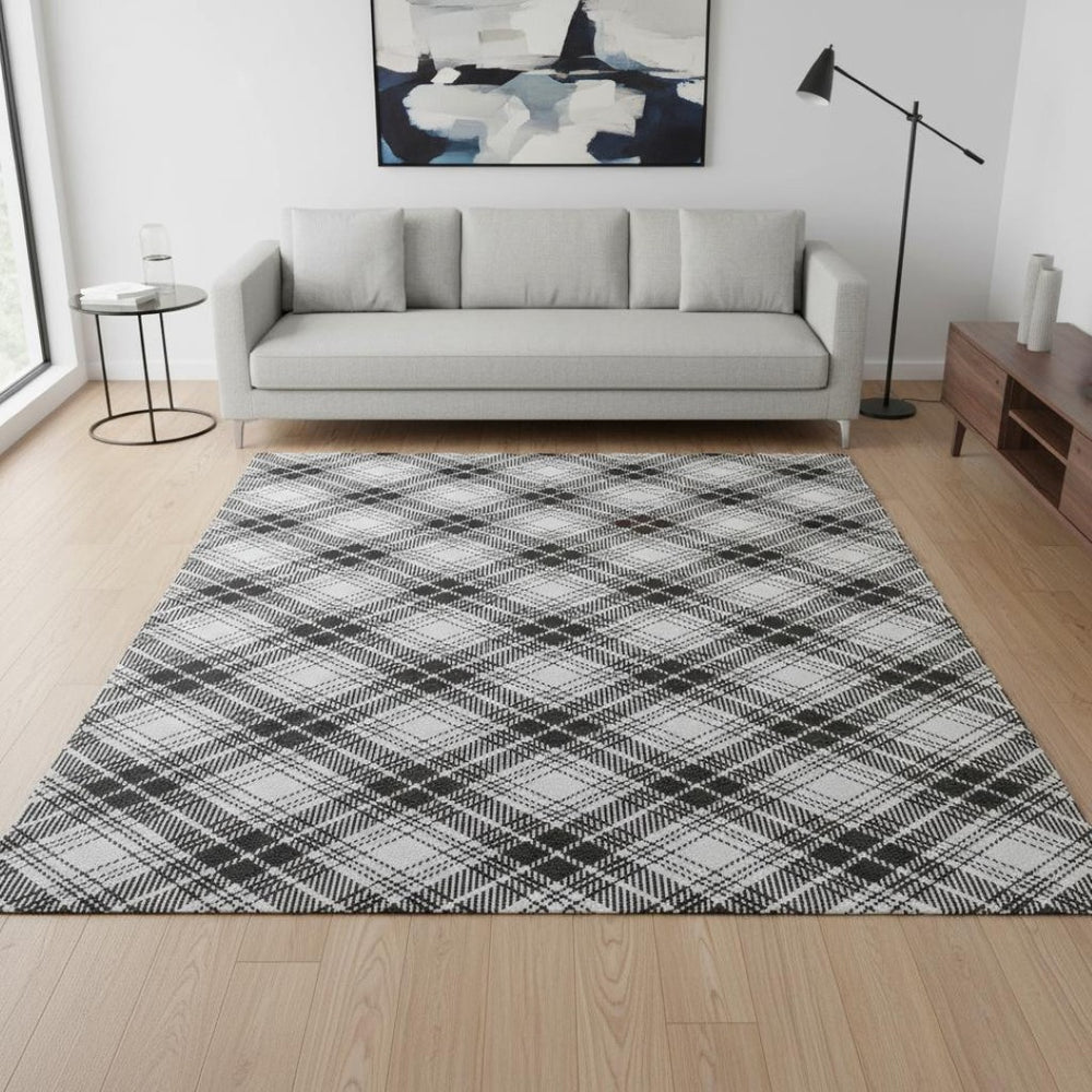 HomeRoots 5' X 8' Plaid Area Rug in Black, Red & Ivory - Washable, Durable, UV-Protected for Busy Homes 678211