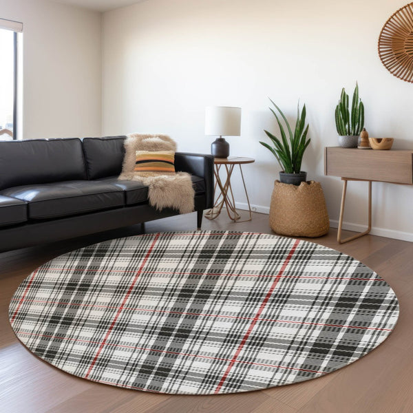 HomeRoots 8' Black Red And Ivory Plaid Washable Round Rug - Durable, UV Protected, Perfect for Busy Homes! 678212