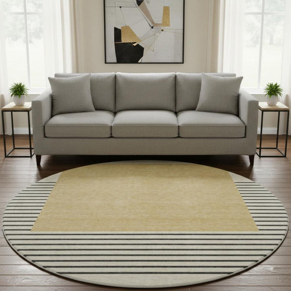 HomeRoots 8' Stylish Gold, Ivory & Black Striped Washable Round Rug with UV Protection for Busy Homes 678344
