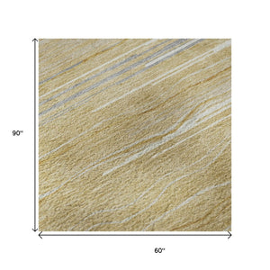 HomeRoots 5' X 8' Striped Gold Gray Ivory Washable Area Rug with UV Protection for Durable, Stylish Living Spaces 678367