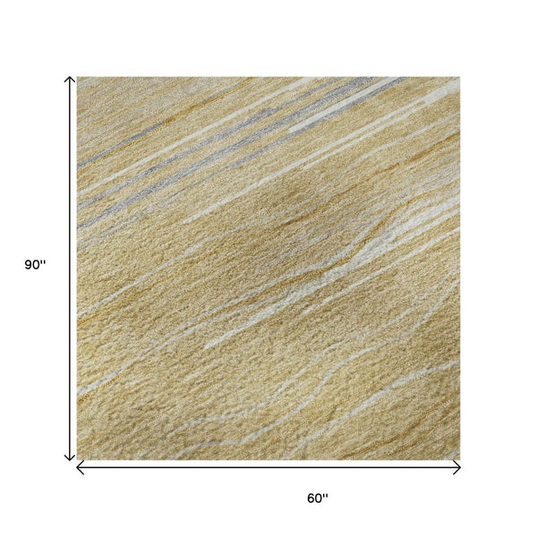 HomeRoots 5' X 8' Striped Gold Gray Ivory Washable Area Rug with UV Protection for Durable, Stylish Living Spaces 678367