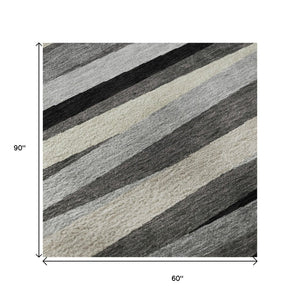HomeRoots 5' X 8' Striped Area Rug in Gray, Silver & Beige - Washable, UV Protected, Perfect for High-Traffic Areas 678486