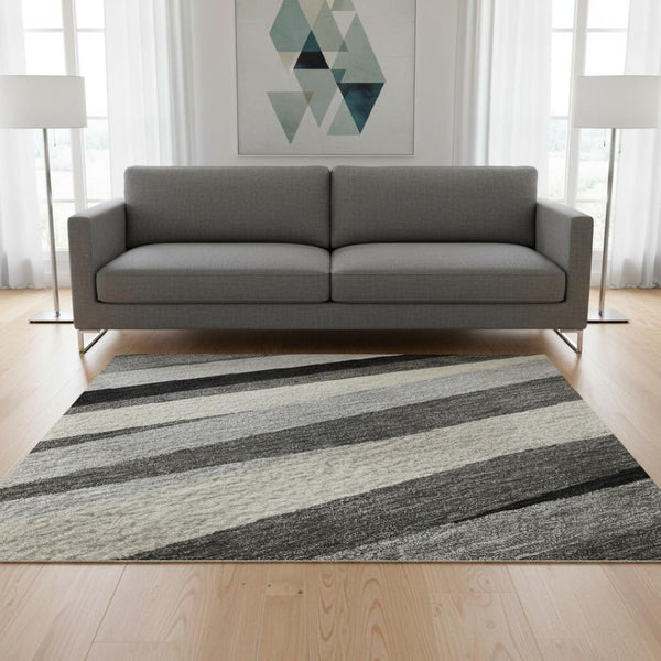 HomeRoots 5' X 8' Striped Area Rug in Gray, Silver & Beige - Washable, UV Protected, Perfect for High-Traffic Areas 678486