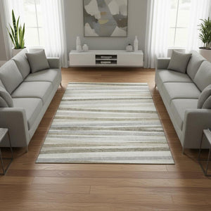 HomeRoots 10' Striped Washable Area Rug in Ivory, Beige & Taupe - UV Protected, Stain Resistant & Stylish Design 678496