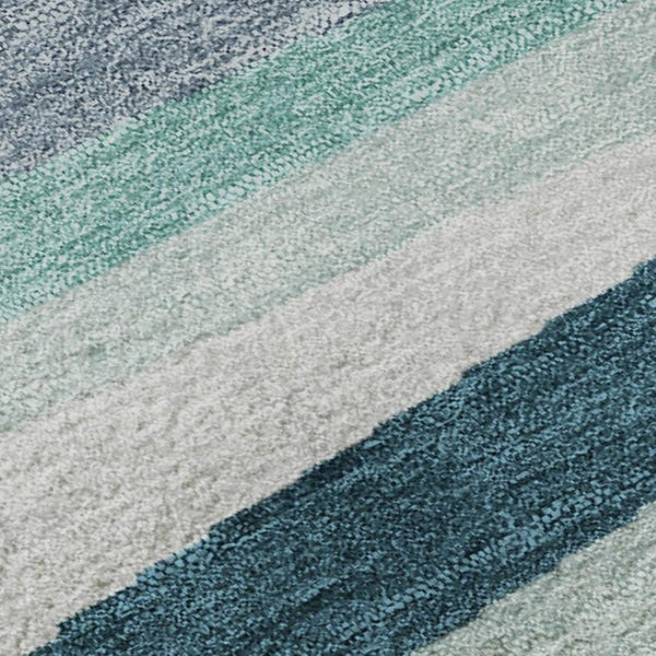 HomeRoots 8' Teal Ivory and Blue Striped Washable Round Rug – Durable, UV-Protected, Ideal for Indoor & Outdoor Use 678523
