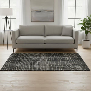 HomeRoots 5' Stylish Washable Striped Area Rug in Black, Ivory & Beige with UV Protection for High-Traffic Spaces 678534