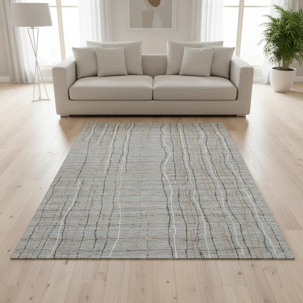HomeRoots 5' X 8' Gray Gold and Ivory Striped Washable Area Rug with UV Protection for Stylish Living Spaces 678552