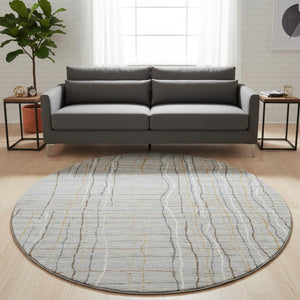HomeRoots 8' Stylish Gray Gold Ivory Striped Washable Round Area Rug with UV Protection for Everyday Living 678553