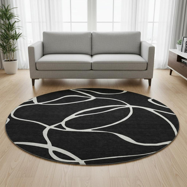 HomeRoots 8' Washable Round Rug - Black & Ivory Abstract Design, UV Resistant, Family-Friendly & Durable! 678619