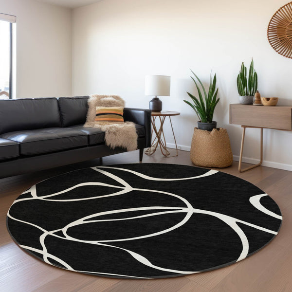 HomeRoots 8' Washable Round Rug - Black & Ivory Abstract Design, UV Resistant, Family-Friendly & Durable! 678619