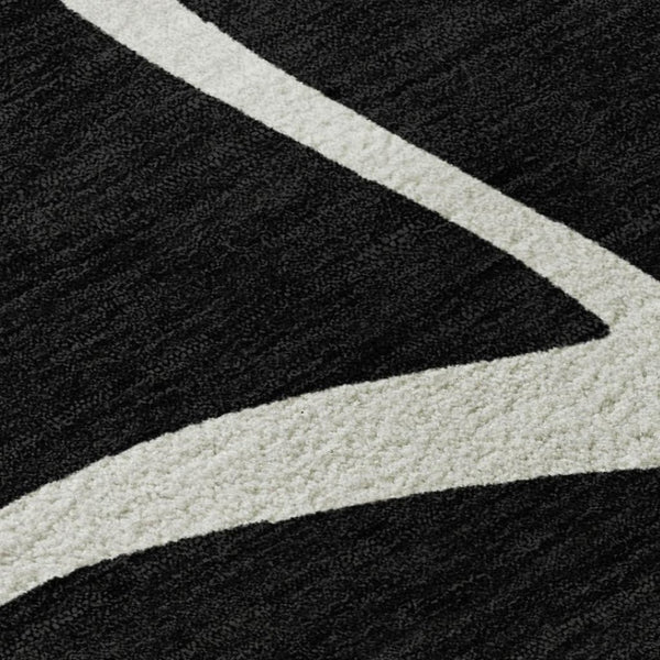 HomeRoots 8' X 10' Black and Ivory Abstract Area Rug - Washable, UV Protected, Perfect for High-Traffic Rooms! 678620
