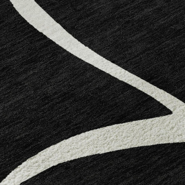 HomeRoots 8' X 10' Black and Ivory Abstract Area Rug - Washable, UV Protected, Perfect for High-Traffic Rooms! 678620