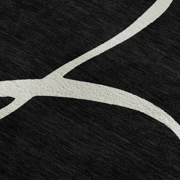 HomeRoots 10' X 14' Black And Ivory Abstract Area Rug - Stylish, Washable, UV-Protected, Perfect for High-Traffic Homes 678622