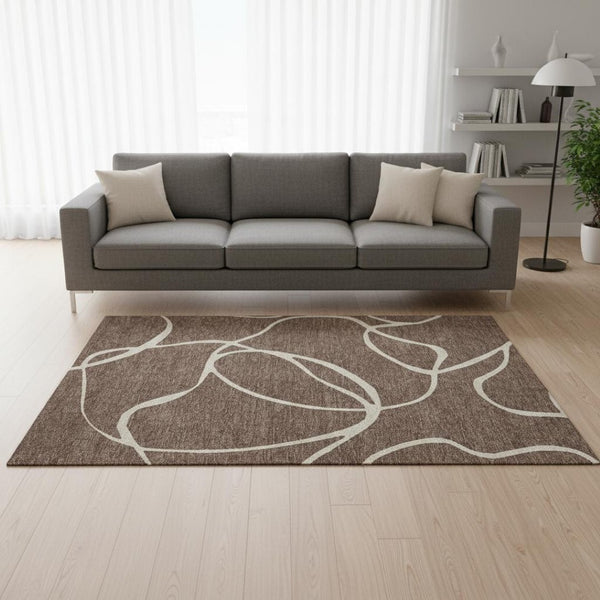 HomeRoots 5' X 8' Abstract Brown and Beige Area Rug - Washable, UV Protected, Durable for Family Living Spaces 678624