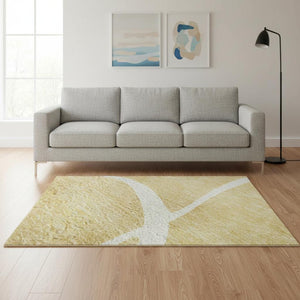 HomeRoots 5' X 8' Gold And Ivory Abstract Area Rug - Washable, Stain-Resistant, UV-Protected for Modern Homes 678636