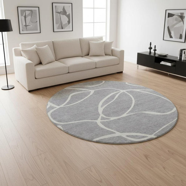 HomeRoots 8' Gray and Ivory Abstract Round Rug - Washable, UV Protected, Stain Resistant for Busy Homes 678643