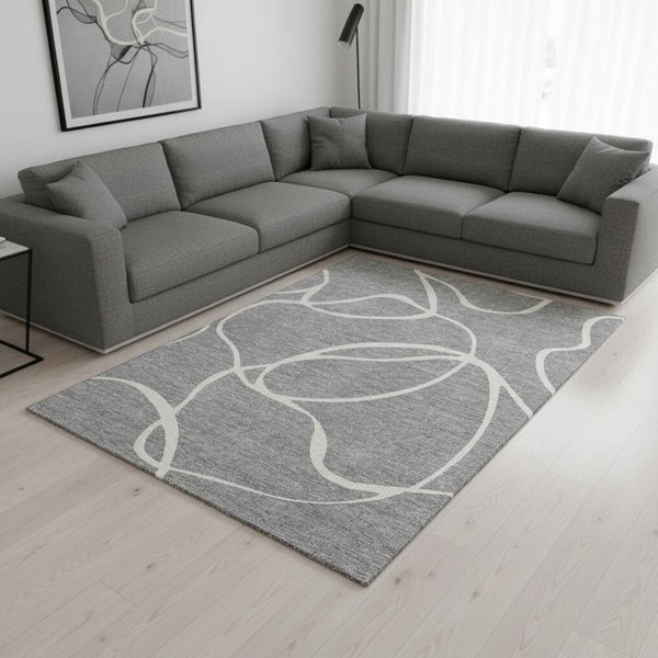 HomeRoots 10' X 14' Gray And Ivory Abstract Washable Area Rug - Durable, UV-Protected, Easy-Care Design Perfect for Any Room 678646