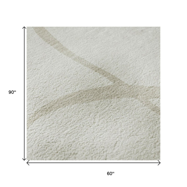 HomeRoots 5' X 8' Ivory and Beige Abstract Area Rug – Machine Washable, Stain Resistant, UV Protected Beauty 678648