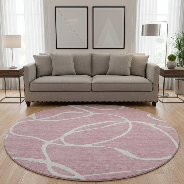 HomeRoots 8' Stylish Pink and Ivory Abstract Washable Round Rug with UV Protection for Modern Homes & Families 678661