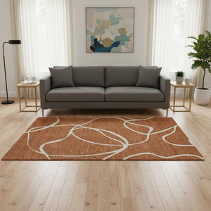 HomeRoots 5' X 8' Abstract Rust and Beige Area Rug – Washable, UV-Protected, Durable Design for Homes with Kids 678666
