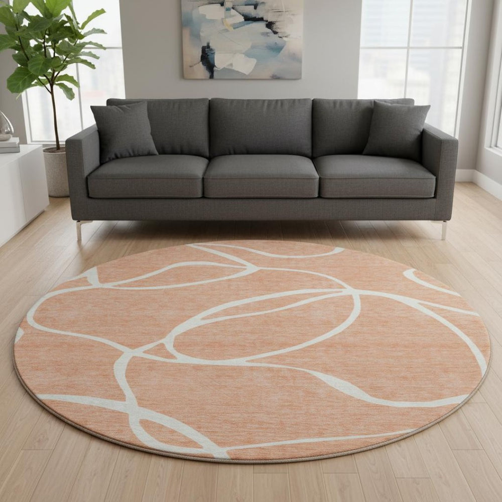 HomeRoots 8' Salmon and Ivory Round Rug – Washable, UV-Protected, Stylish Abstract Design for Modern Spaces 678679