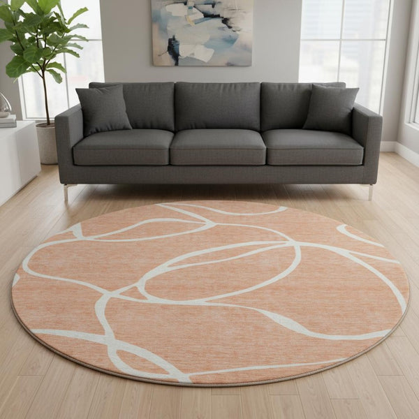 HomeRoots 8' Salmon and Ivory Round Rug – Washable, UV-Protected, Stylish Abstract Design for Modern Spaces 678679
