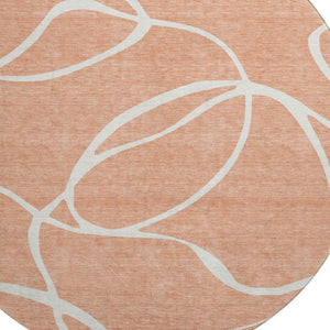 HomeRoots 8' Salmon and Ivory Round Rug – Washable, UV-Protected, Stylish Abstract Design for Modern Spaces 678679