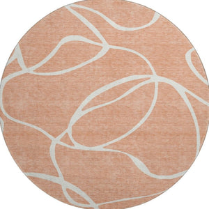 HomeRoots 8' Salmon and Ivory Round Rug – Washable, UV-Protected, Stylish Abstract Design for Modern Spaces 678679