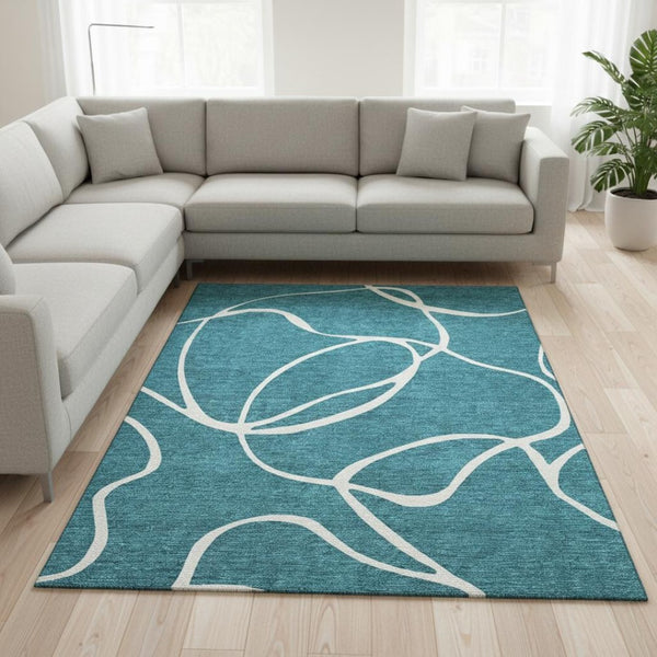 HomeRoots 8' X 10' Teal and Ivory Abstract Washable Area Rug - UV Protected, Stain Resistant for Easy Care! 678686