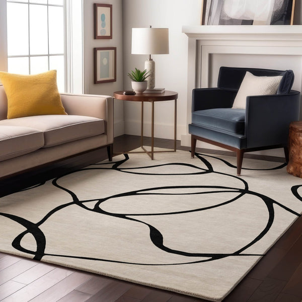 HomeRoots 5' X 8' White and Black Abstract Area Rug - Washable, UV Protected, Stylish for High-Traffic Spaces 678690