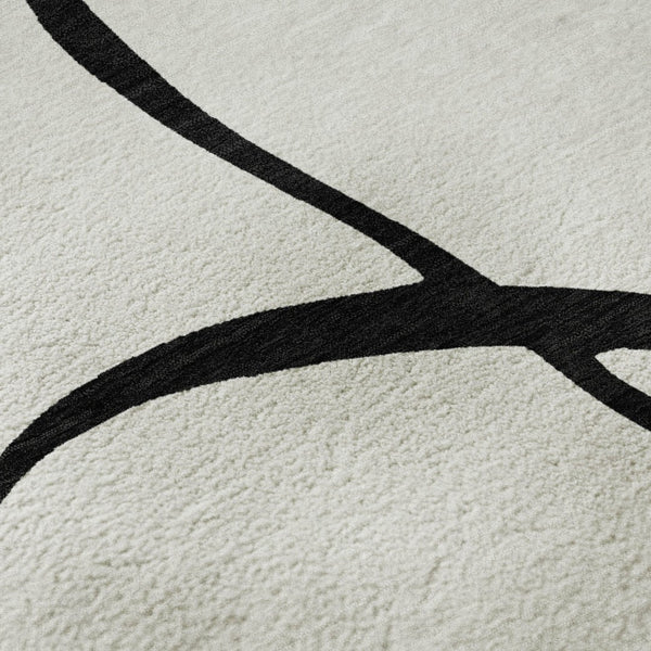 HomeRoots 5' X 8' White and Black Abstract Area Rug - Washable, UV Protected, Stylish for High-Traffic Spaces 678690