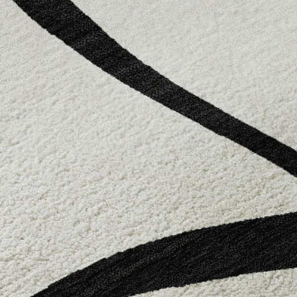 HomeRoots 5' X 8' White and Black Abstract Area Rug - Washable, UV Protected, Stylish for High-Traffic Spaces 678690