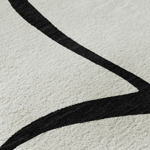 HomeRoots 5' X 8' White and Black Abstract Area Rug - Washable, UV Protected, Stylish for High-Traffic Spaces 678690