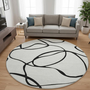 HomeRoots 8' Stylish Washable Round Rug with Abstract Black and White Design, UV Protection & Durability 678691