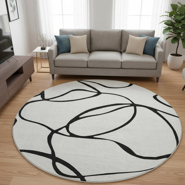 HomeRoots 8' Stylish Washable Round Rug with Abstract Black and White Design, UV Protection & Durability 678691