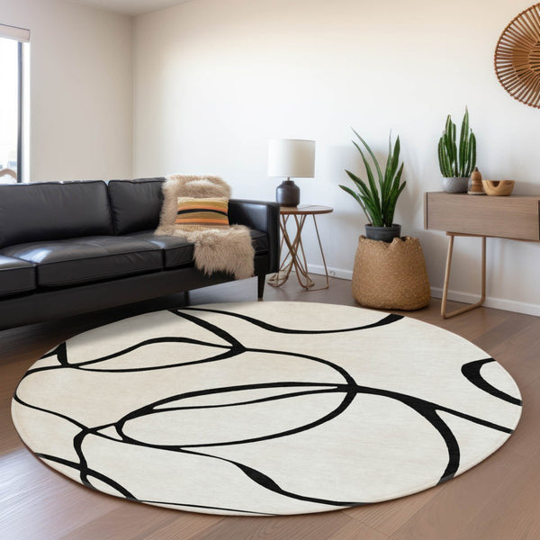 HomeRoots 8' Stylish Washable Round Rug with Abstract Black and White Design, UV Protection & Durability 678691