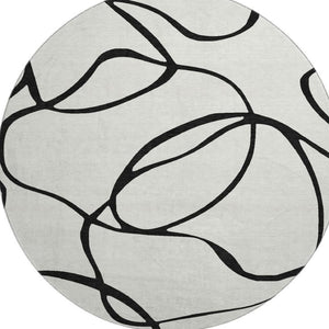 HomeRoots 8' Stylish Washable Round Rug with Abstract Black and White Design, UV Protection & Durability 678691