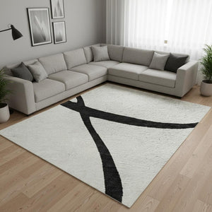 HomeRoots 8' X 10' Abstract Black & White Washable Area Rug with UV Protection for Modern Living Spaces 678692