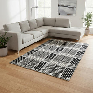 HomeRoots 8' X 10' Stylish Black Ivory Taupe Plaid Washable Area Rug with UV Defense for Busy Homes 678704