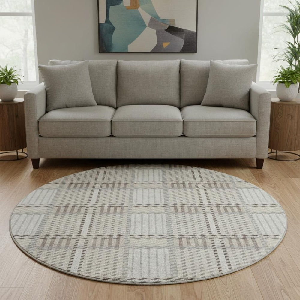 HomeRoots 8' Ivory Taupe and Gray Plaid Washable Round Rug with UV Protection for High-Traffic Spaces 678727