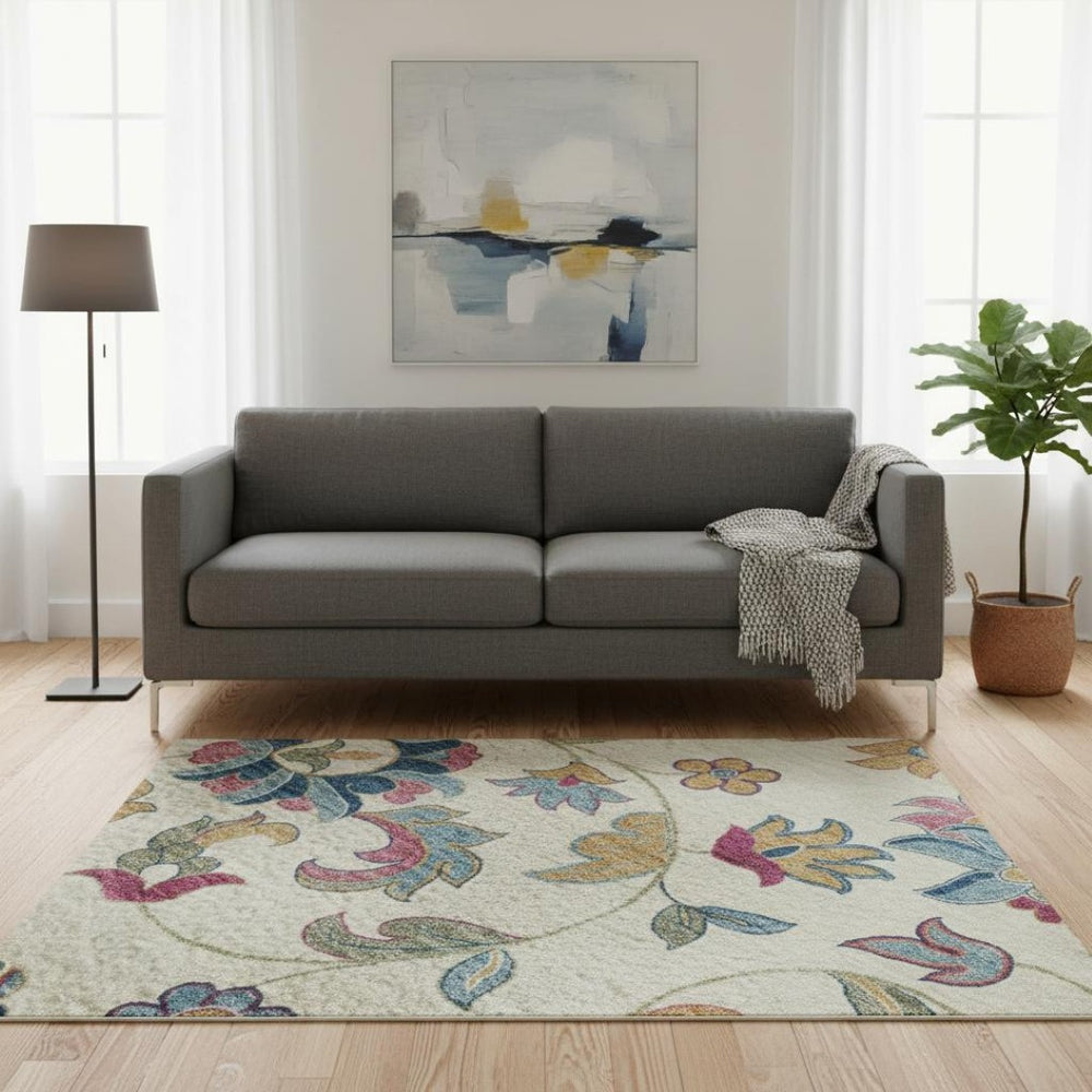 HomeRoots 5' X 8' Vintage-Inspired Pink and Blue Floral Area Rug - Washable, UV Protected, Stain Resistant Design 678984