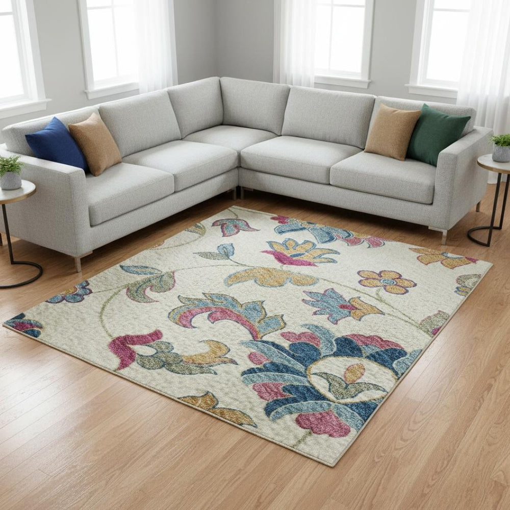 HomeRoots 10' Pink and Blue Floral Area Rug – Washable, UV-Protected, Durable Design for Homes with Kids & Pets 678988