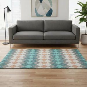 HomeRoots 5' X 8' Teal Coral & Ivory Geometric Area Rug - Washable, Stain Resistant, and UV Protected Design 679086