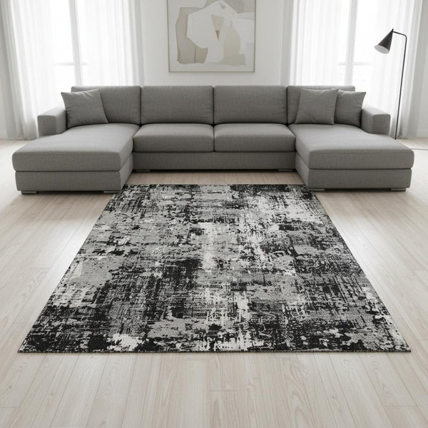 HomeRoots 8' X 10' Washable Abstract Area Rug in Black, Ivory & Gray with UV Protection for Modern Homes 679094