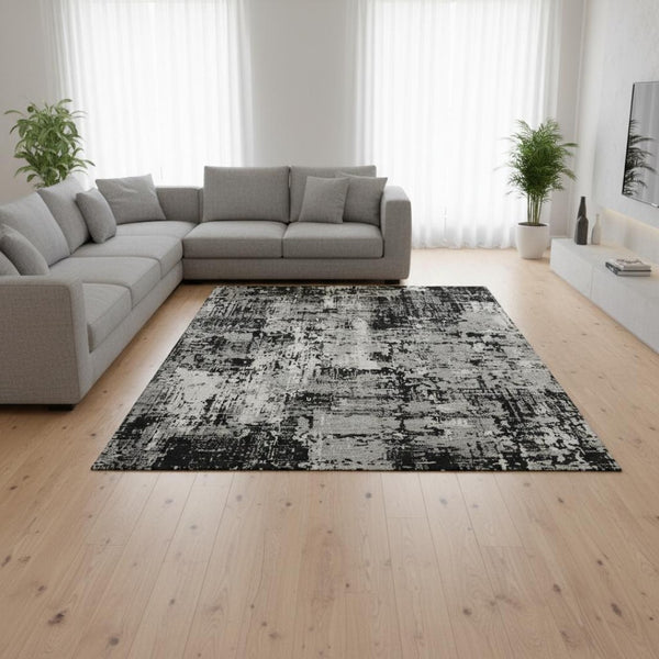 HomeRoots 10' X 14' Stylish Black Ivory Gray Abstract Washable Area Rug with UV Protection for High Traffic Spaces 679096