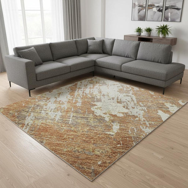 HomeRoots 9' X 12' Copper Ivory Gold Abstract Area Rug – Washable, UV Protected, Durable for High-Traffic Spaces 679113