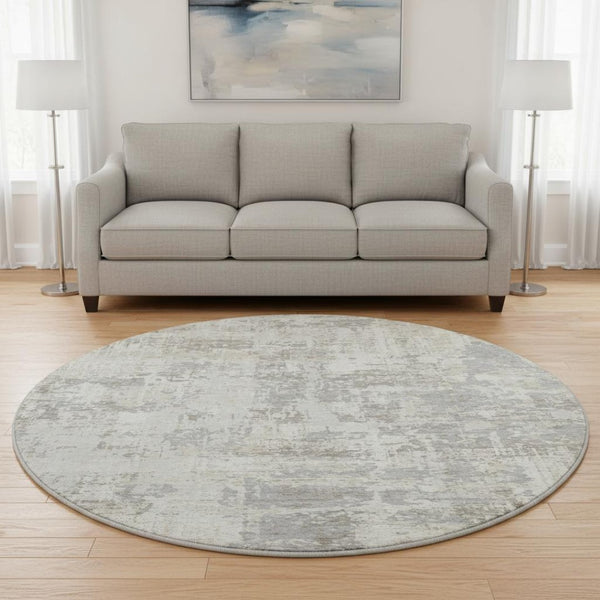 HomeRoots 8' Ivory and Gray Abstract Round Rug – Washable, UV Protected, Durable, Stylish for Busy Homes 679135
